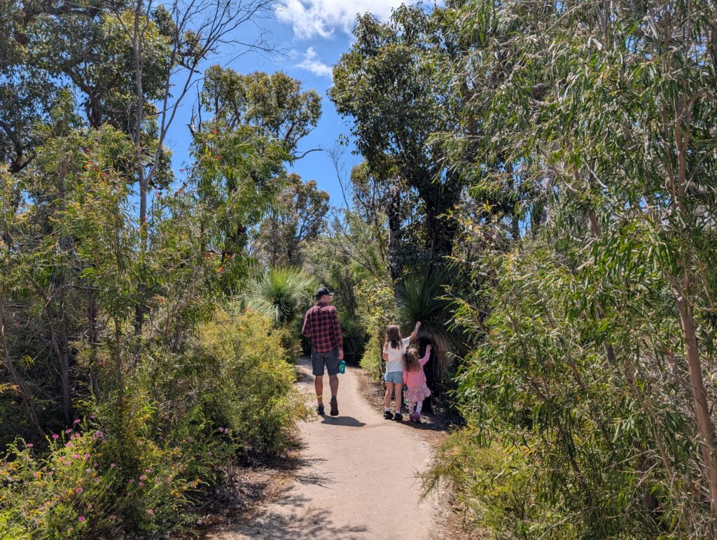 Family in nature near Mammoth Cave in Boranup, Western Australia